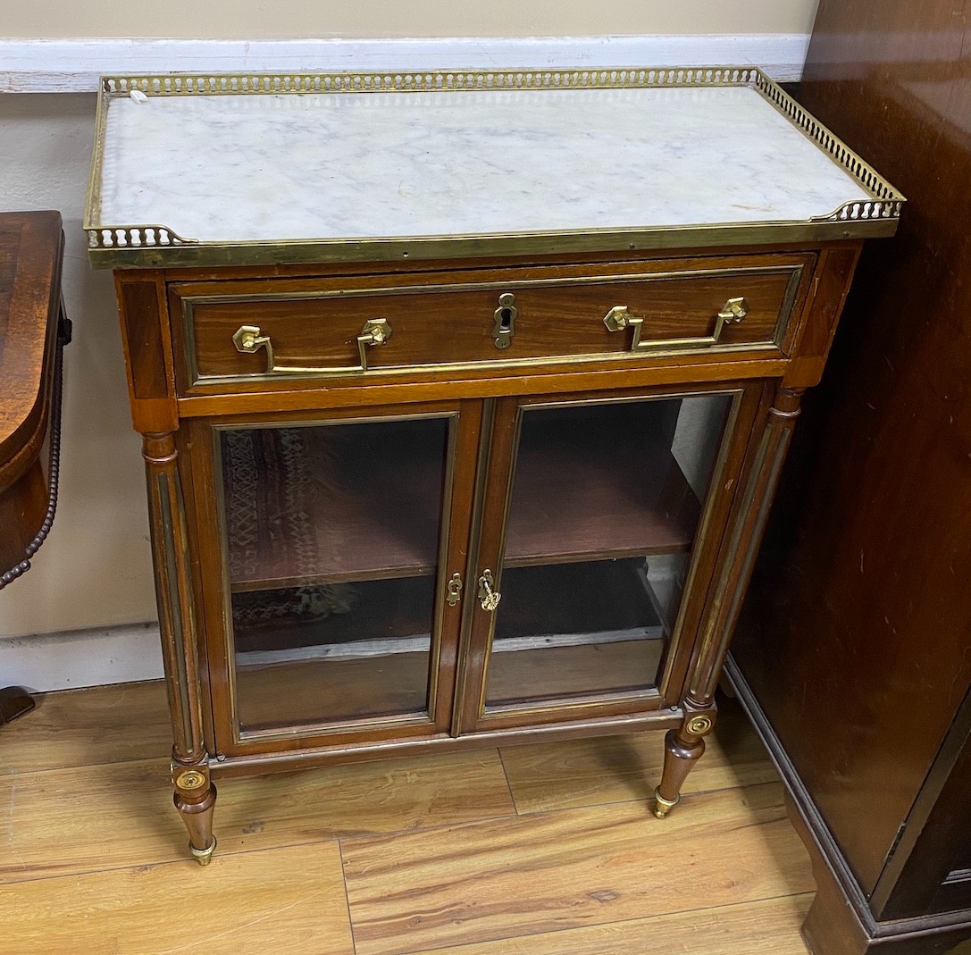 A pair of French brass mounted marble topped glazed mahogany pier cabinets, width 64cm, depth 30cm, height 86cm